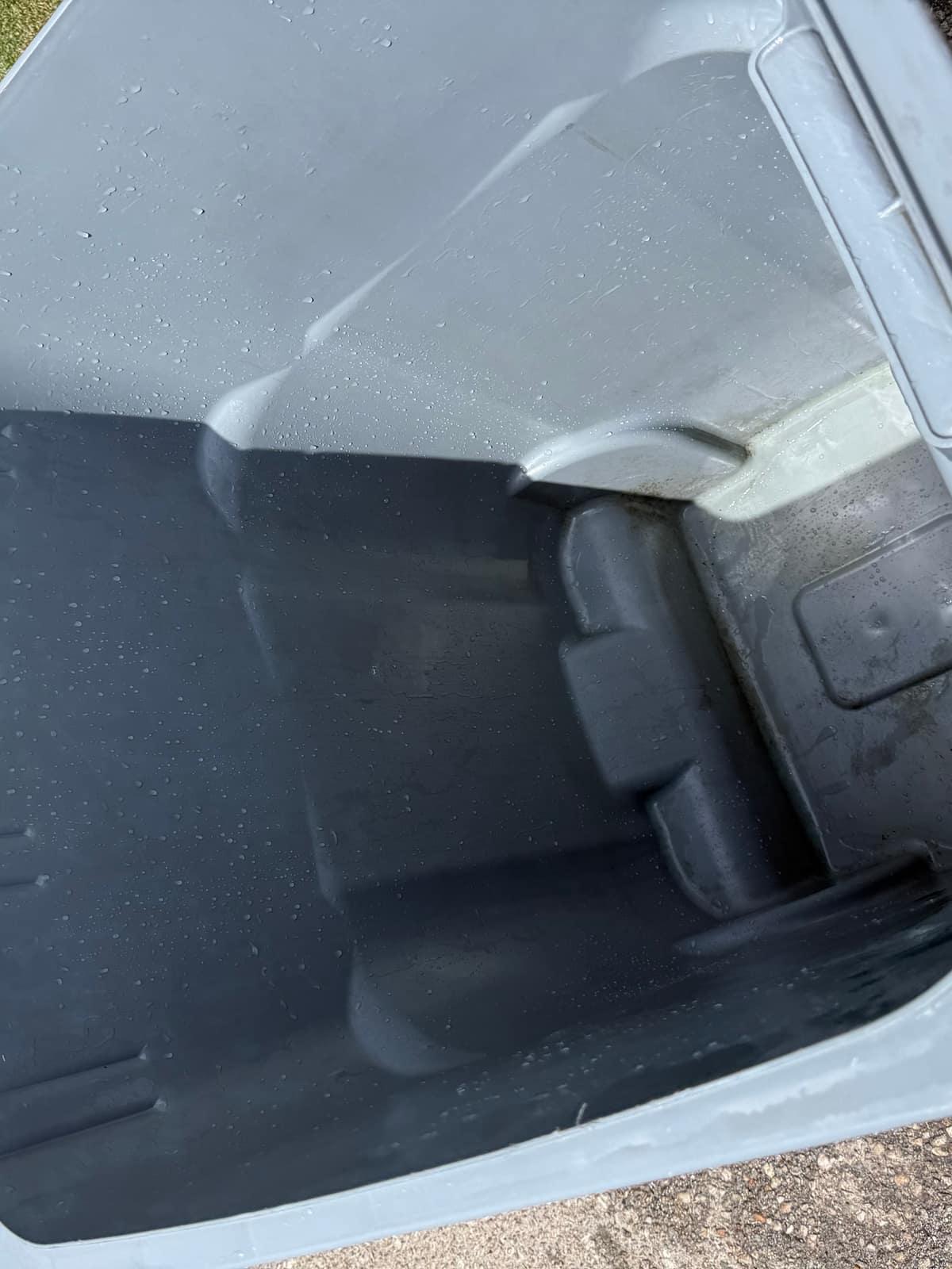 Inside of a clean, rinsed trash bin after a Bin Barber reset